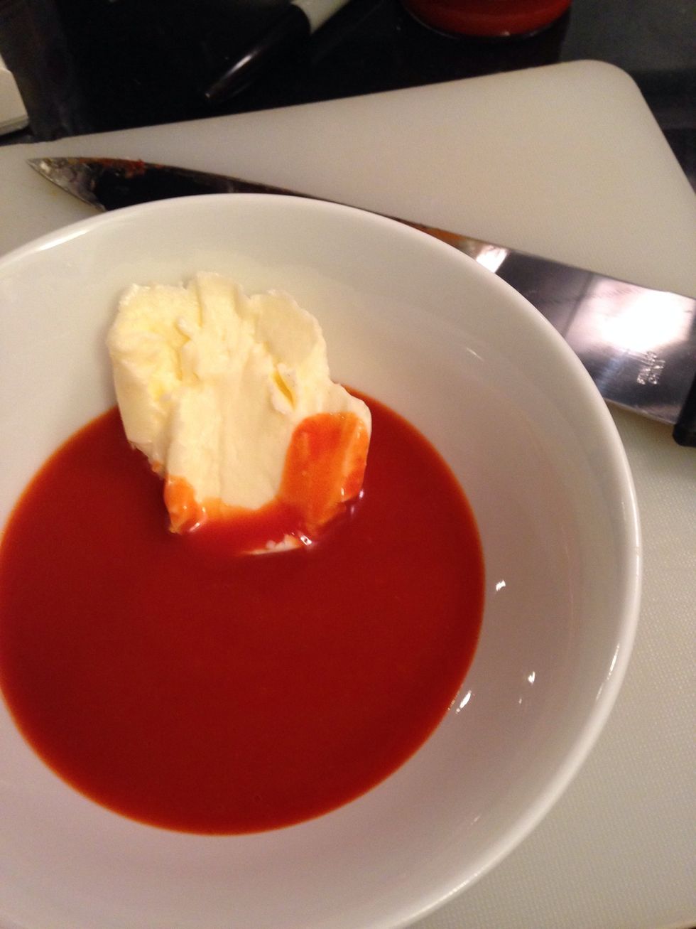 Melt some butter in the hot sauce to make it less fiery