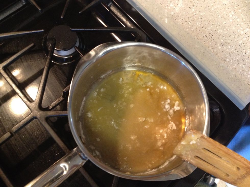 Melt sugar on medium low heat