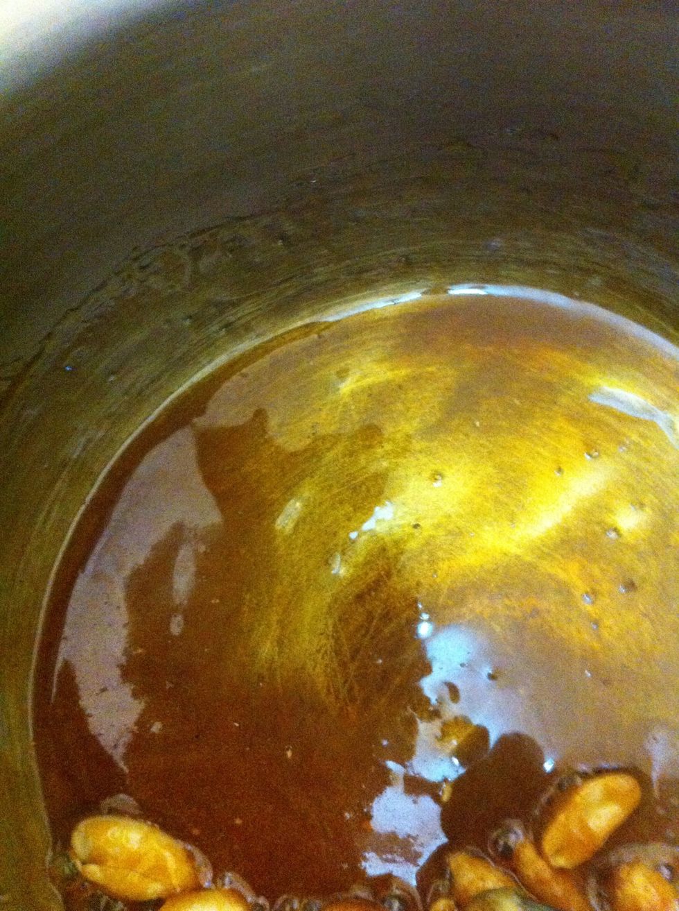 Melt sugar to make caramelized peanut shards