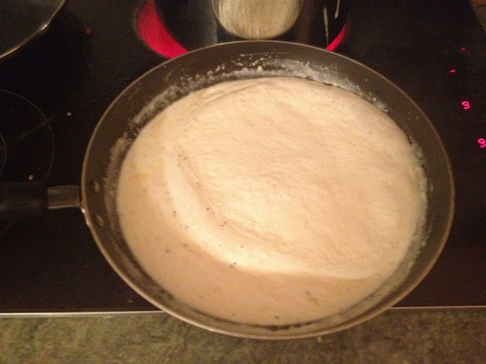 Melt the butter and add the cream. Also add salt and pepper to taste. Let simmer for 8 minutes or until the sauce looks thick. Keep stirring or else the butter will separate.