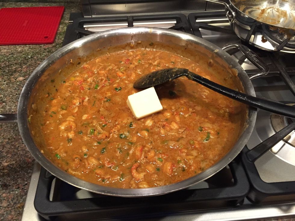 Melt the butter and let simmer for a few minutes, and then YOU'RE DONE. Serve over a small mound of white rice, grab a seat, a good beer, and a bottle of Crystal hot sauce and enjoy your labor.