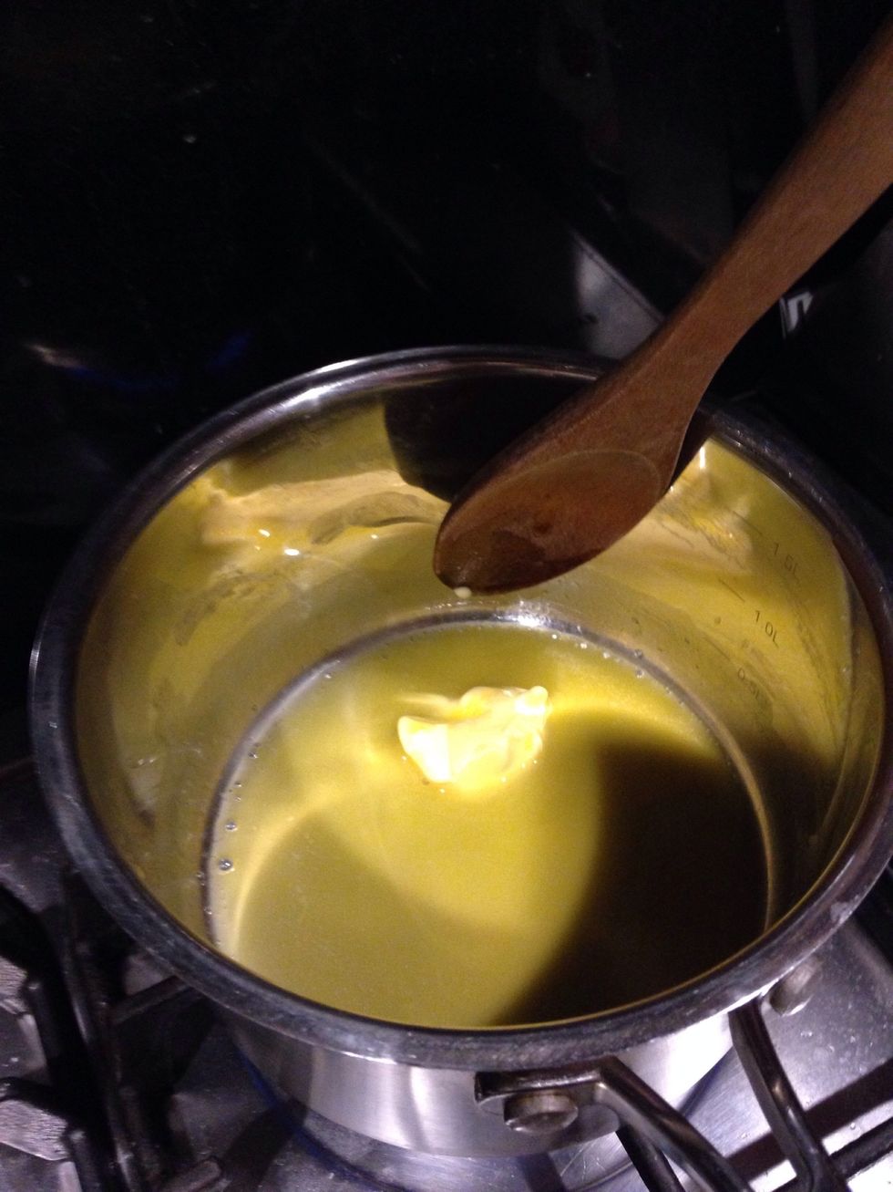 Melt the butter and oil in a saucepan.