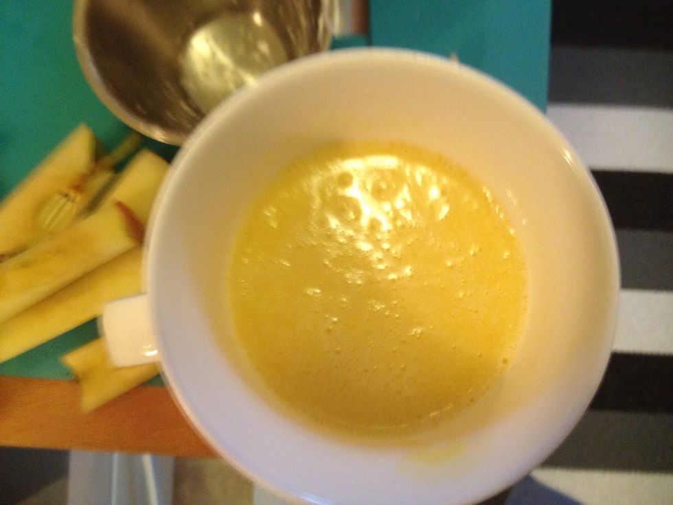 Melt the butter and pour it in a large bowl.