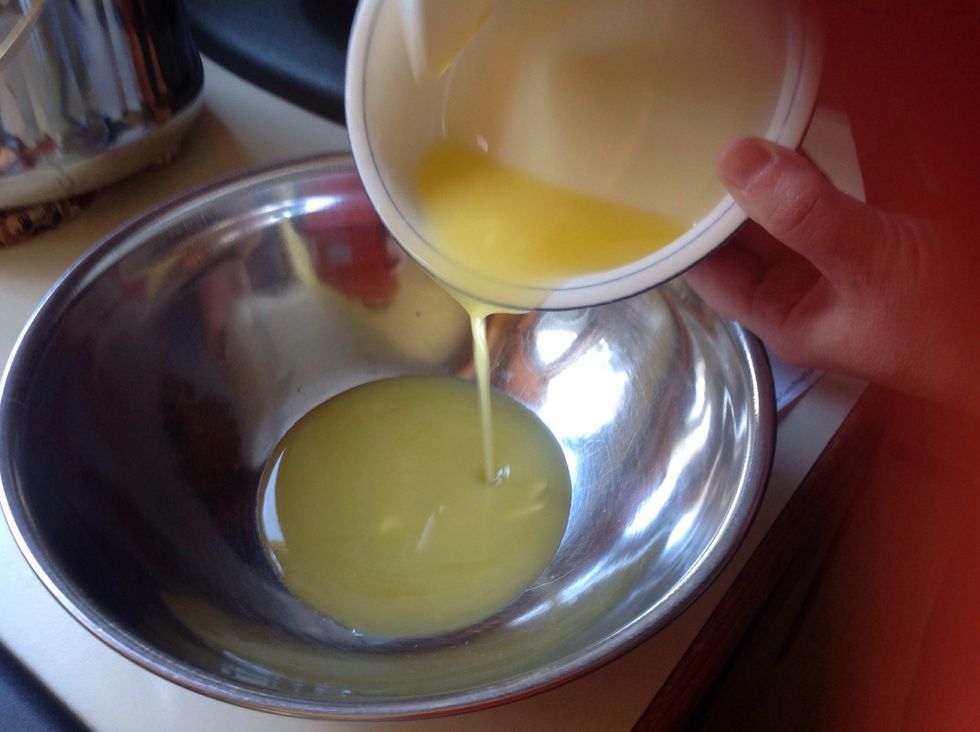 Melt the butter and pour it into the bowl