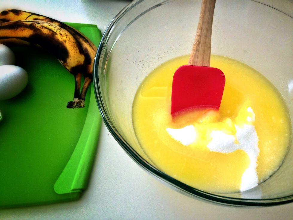 Melt the butter and stir in the sugar.