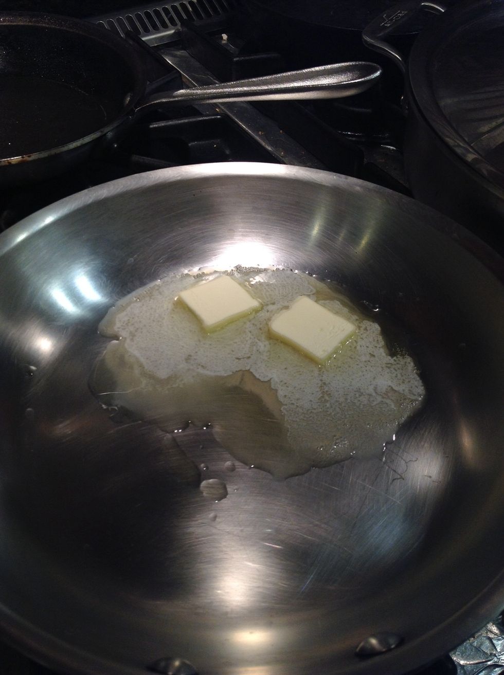 Melt the butter at medium high (7) in the remaining olive oil, until foam subsides.