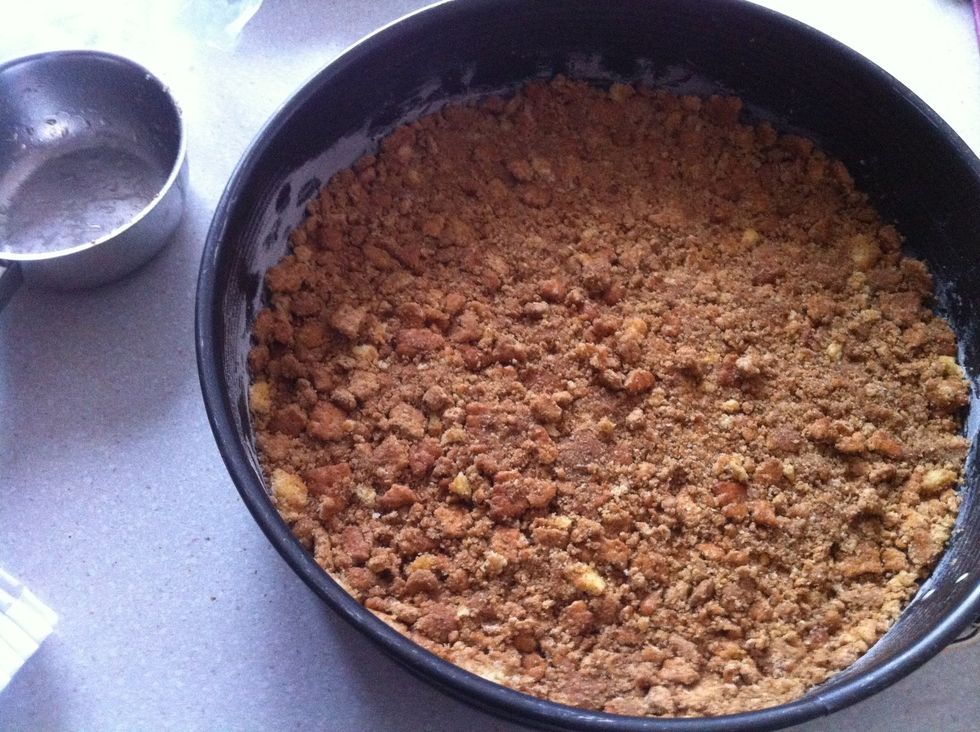 Melt the butter, crunch the cookies, mix both and press it to a cake base.