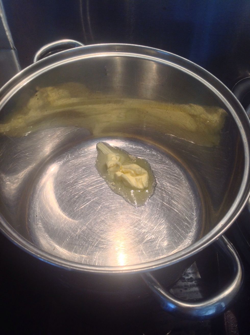 Melt the butter in a big saucepan.