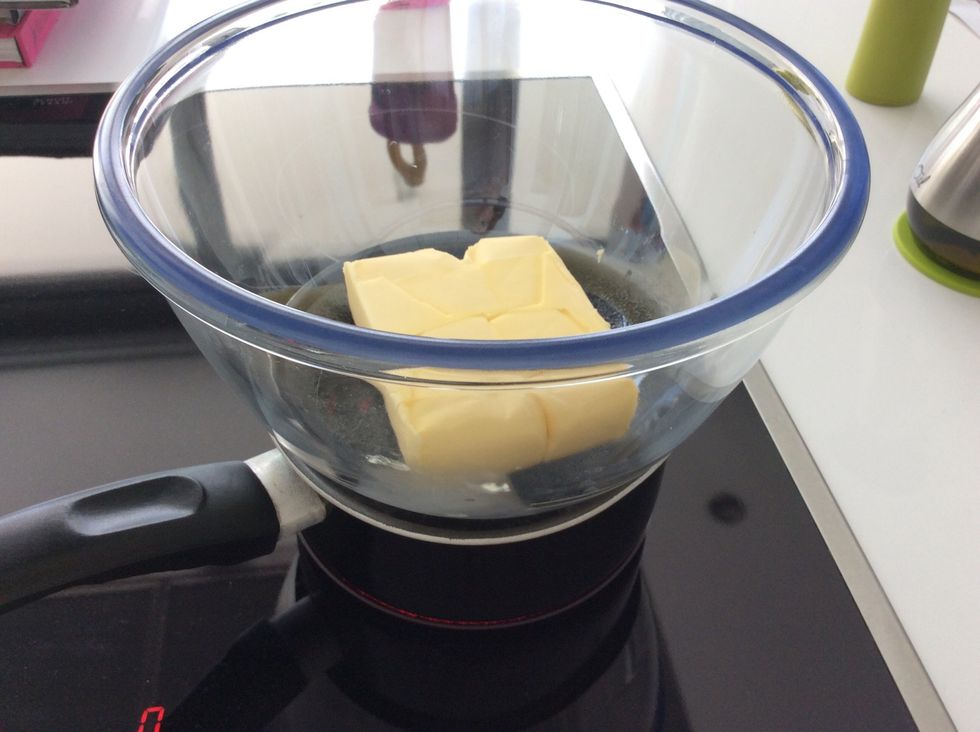 Melt the butter in a bowl (bain marie) where the bowl should not be touching the boiling water