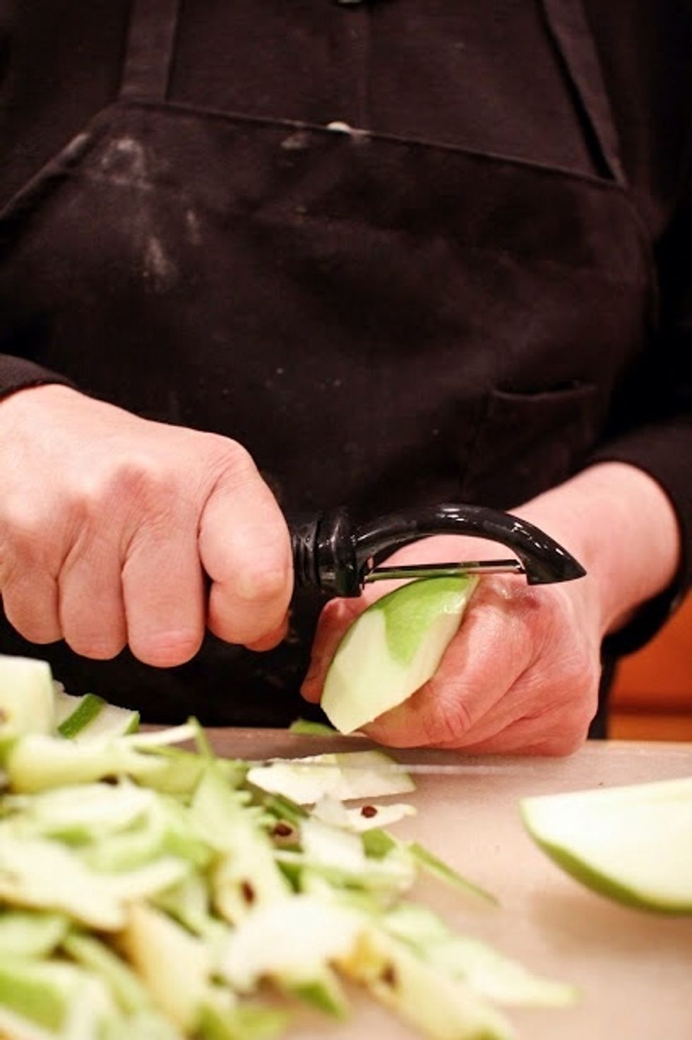 Melt the butter in a large skillet over a low heat. Take the pan off the heat.