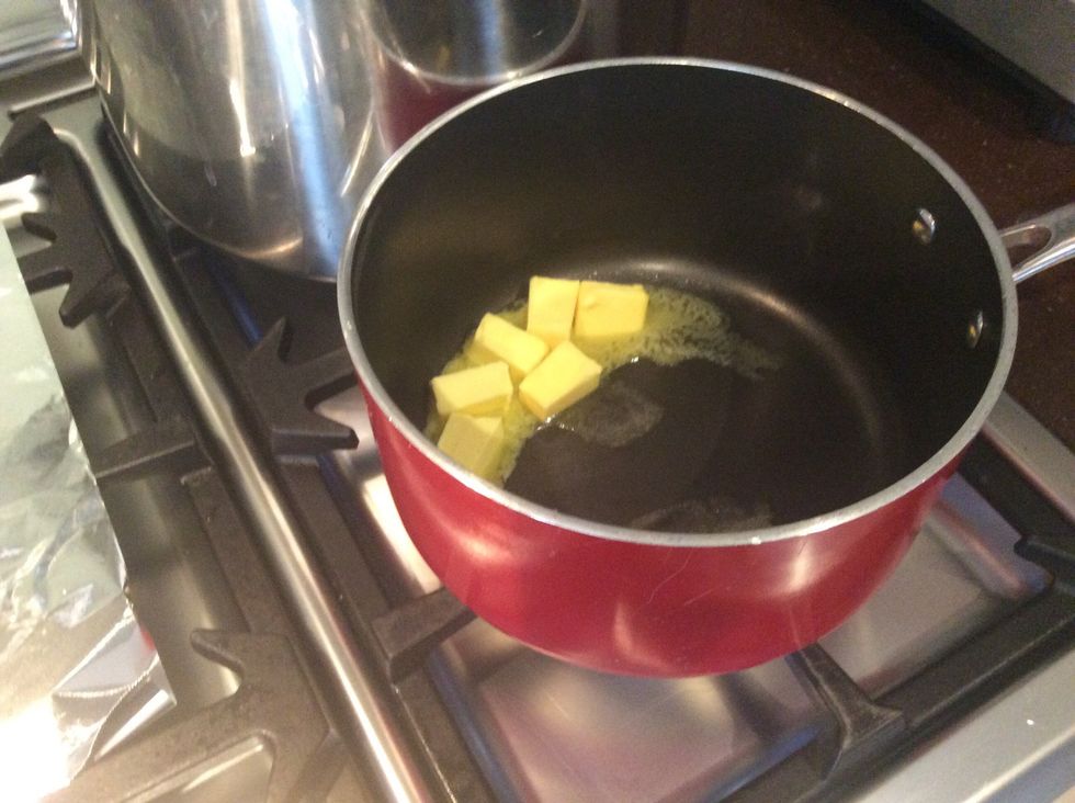 Melt the butter in a medium saucepan over a medium-high heat until it starts foaming