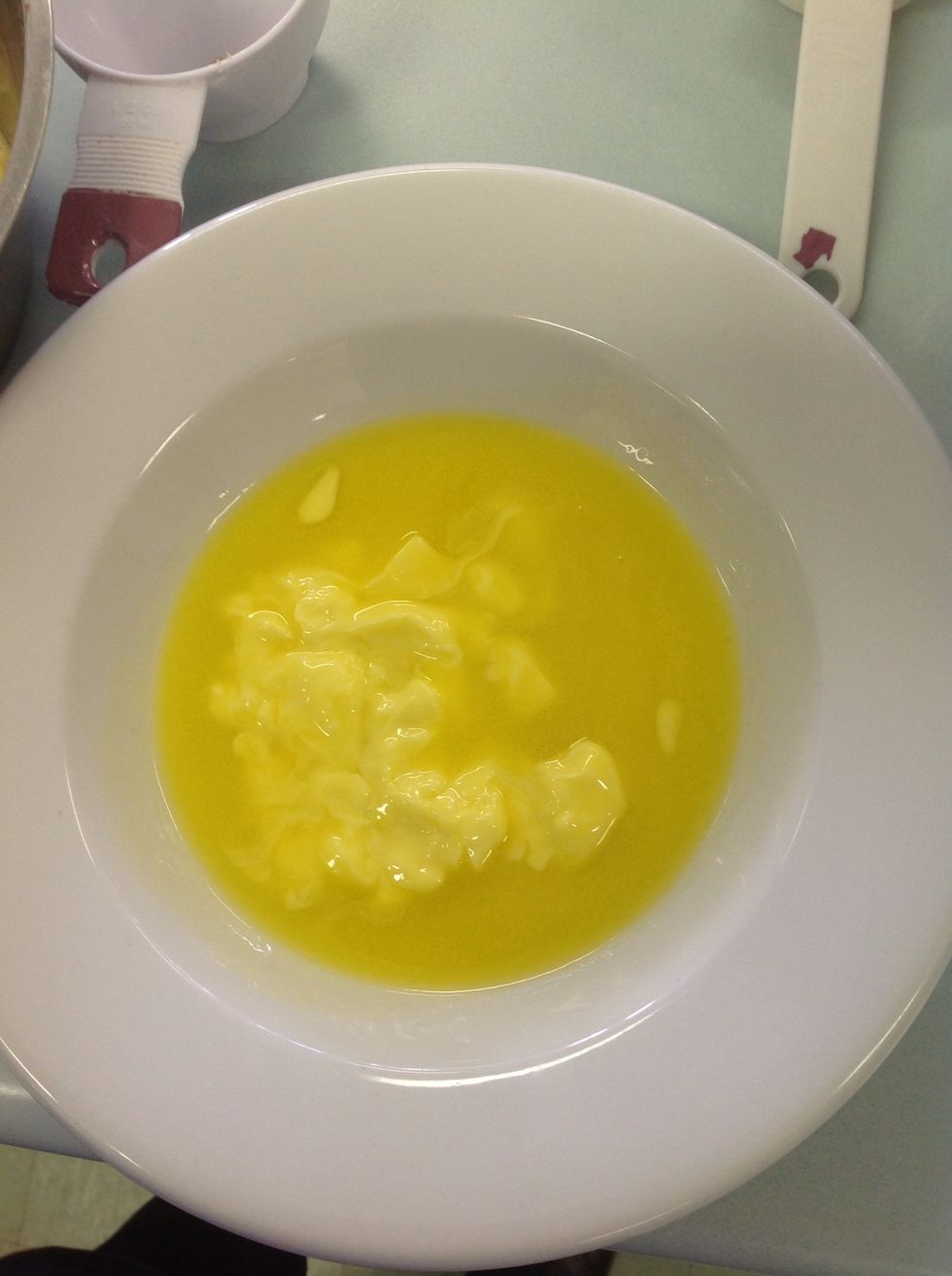 Melt the butter in a microwave safe bowl intone microwave for 25 seconds. Don't worry if the butter's not completely melted, it will melt as your stir it into the mixture