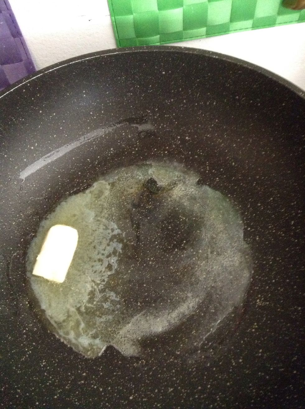 Melt the butter in a pan over low heat.