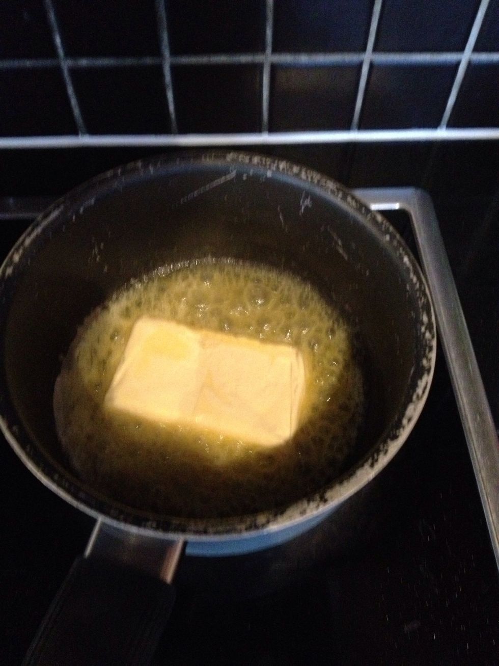Melt the butter in a pan. \ud83d\uddff