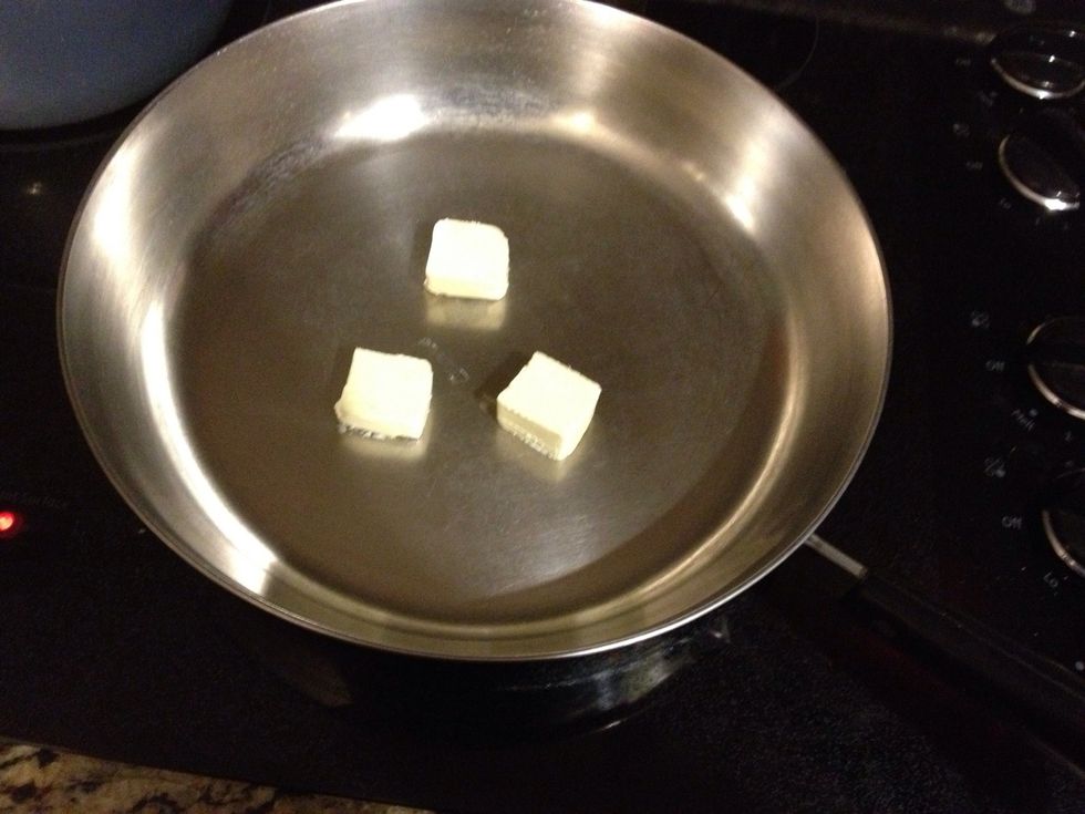 Melt the butter in a skillet on medium heat.