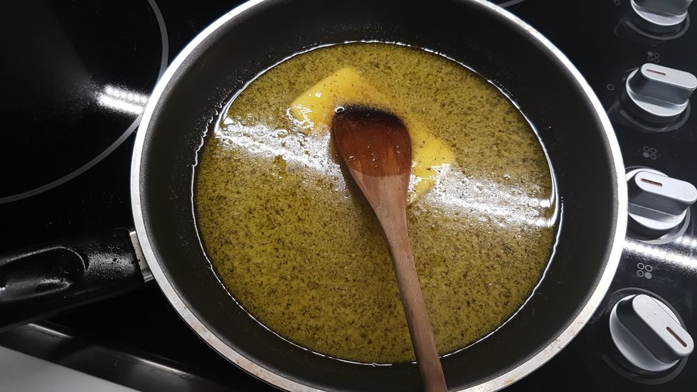 Melt the butter into the syrup and stir until bubbling.