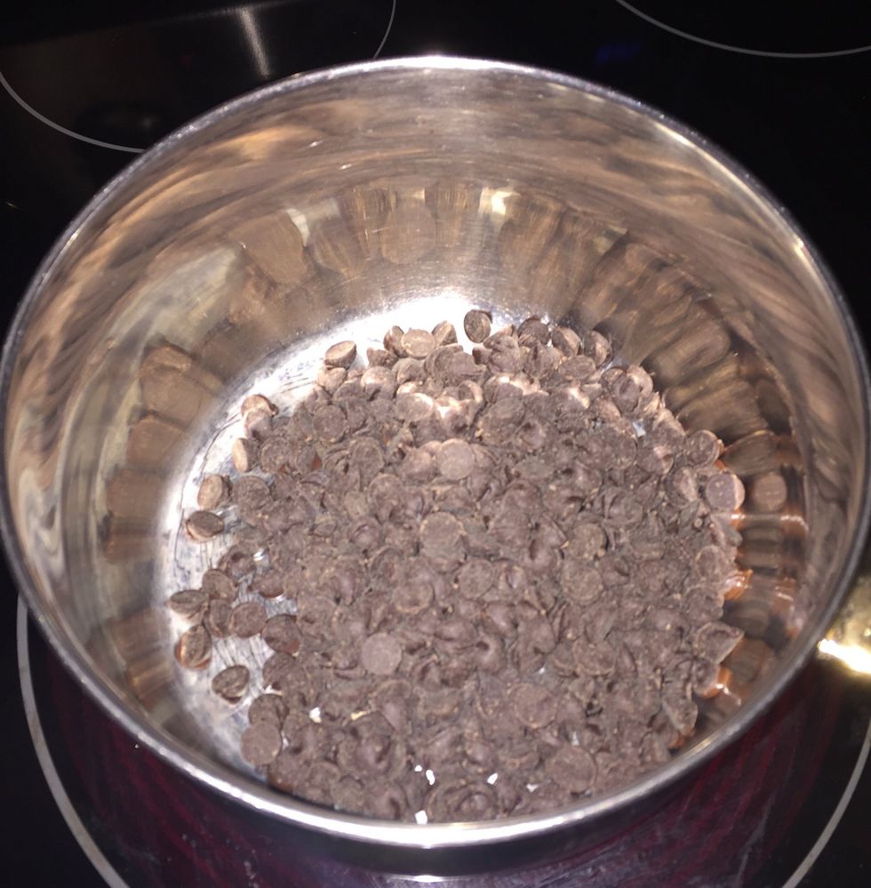 Melt the chocolate chips in a saucepan on medium-low heat.