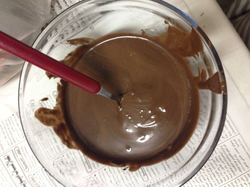 Melt the chocolate ( its baking chocolate by the way ) ( melt in the microwave its easier :D )