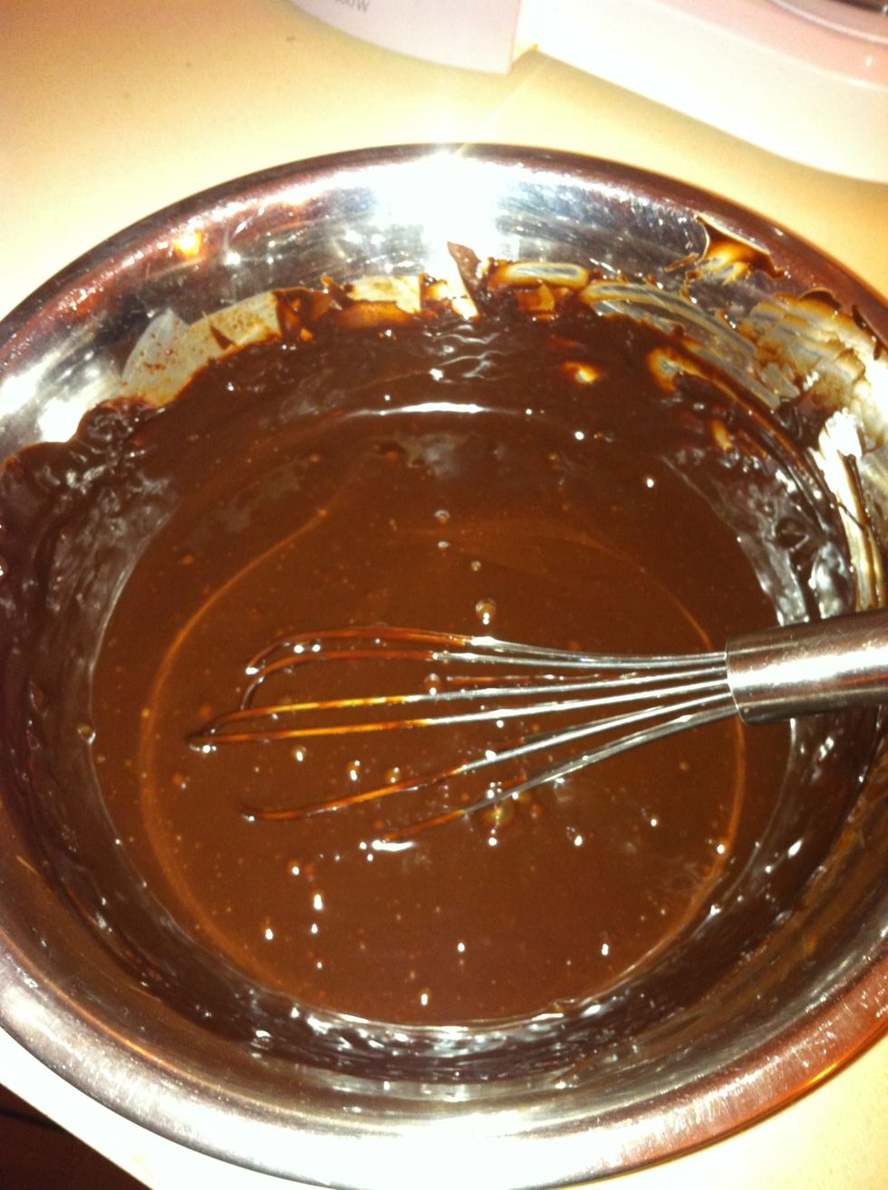 Melt the chocolate on a Bain marry Add the cream and mix