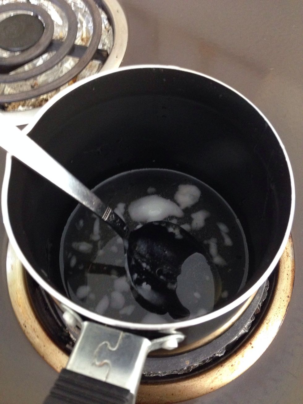 Melt the coconut butter in a pan over a low heat, add the rice malt syrup and gently warm through.