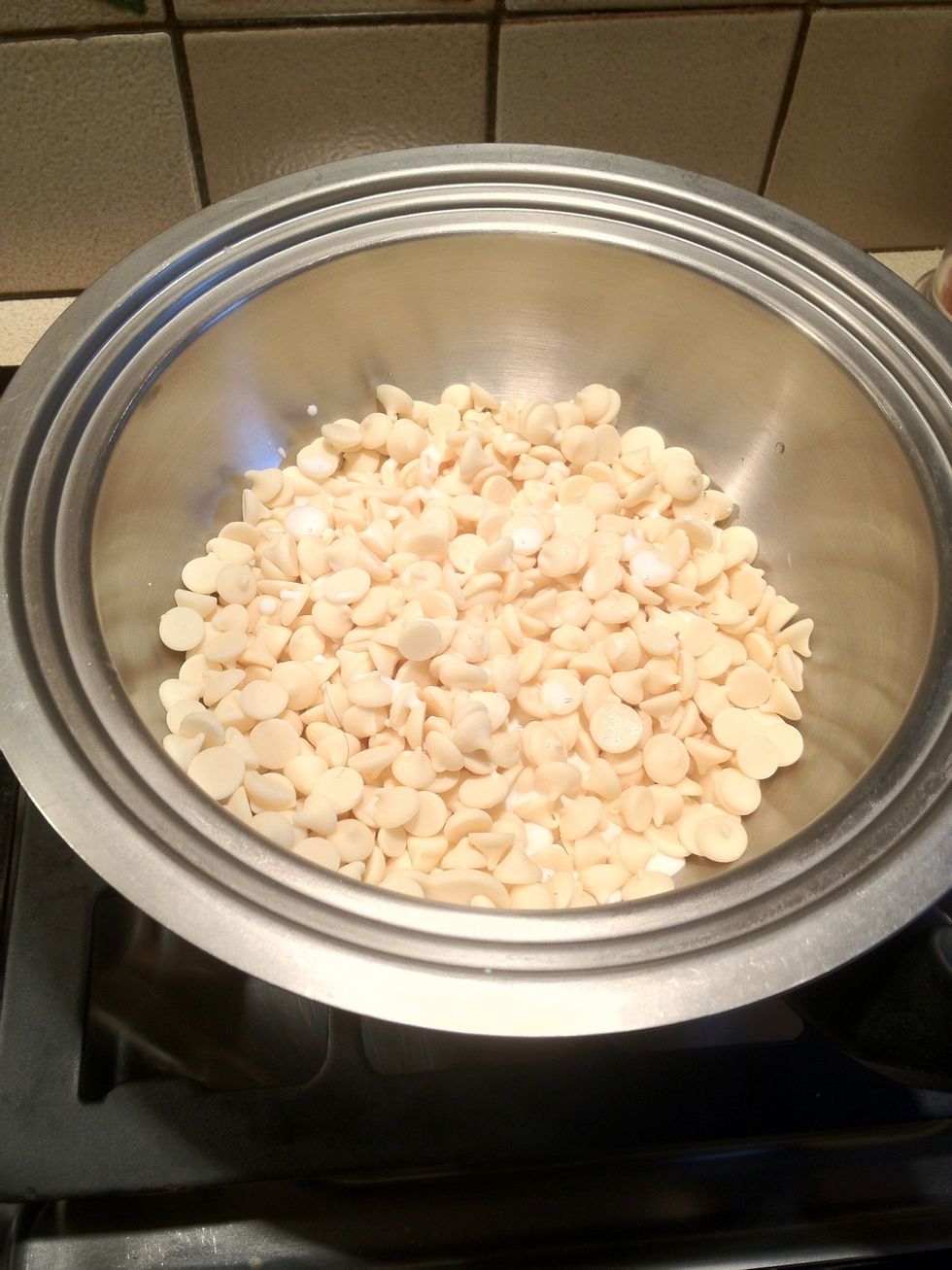 Melt the white chocolate and half and half in a double boiler.