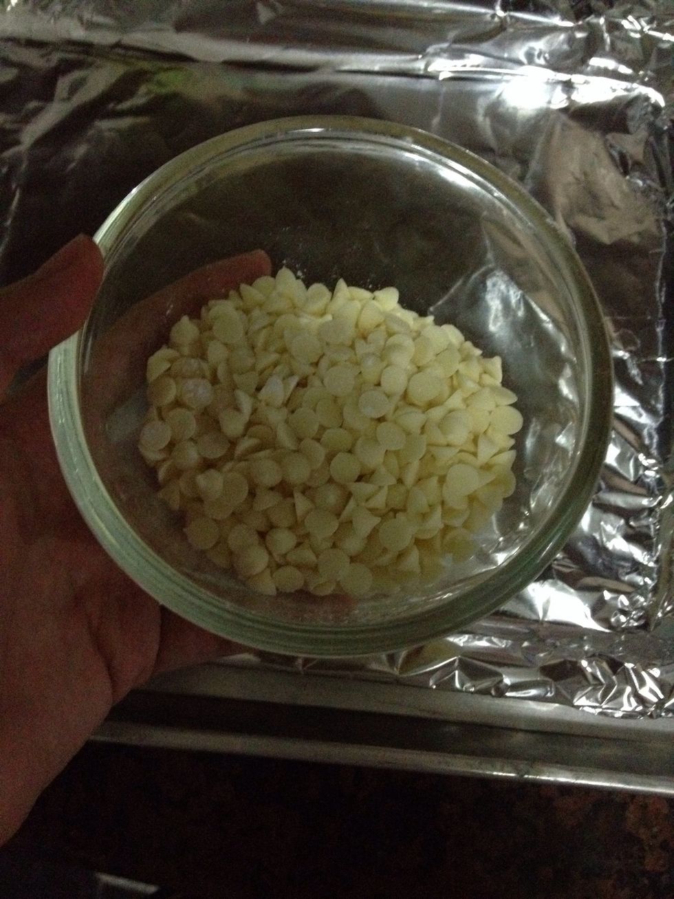 Melt the white chocolate over a double boiler.