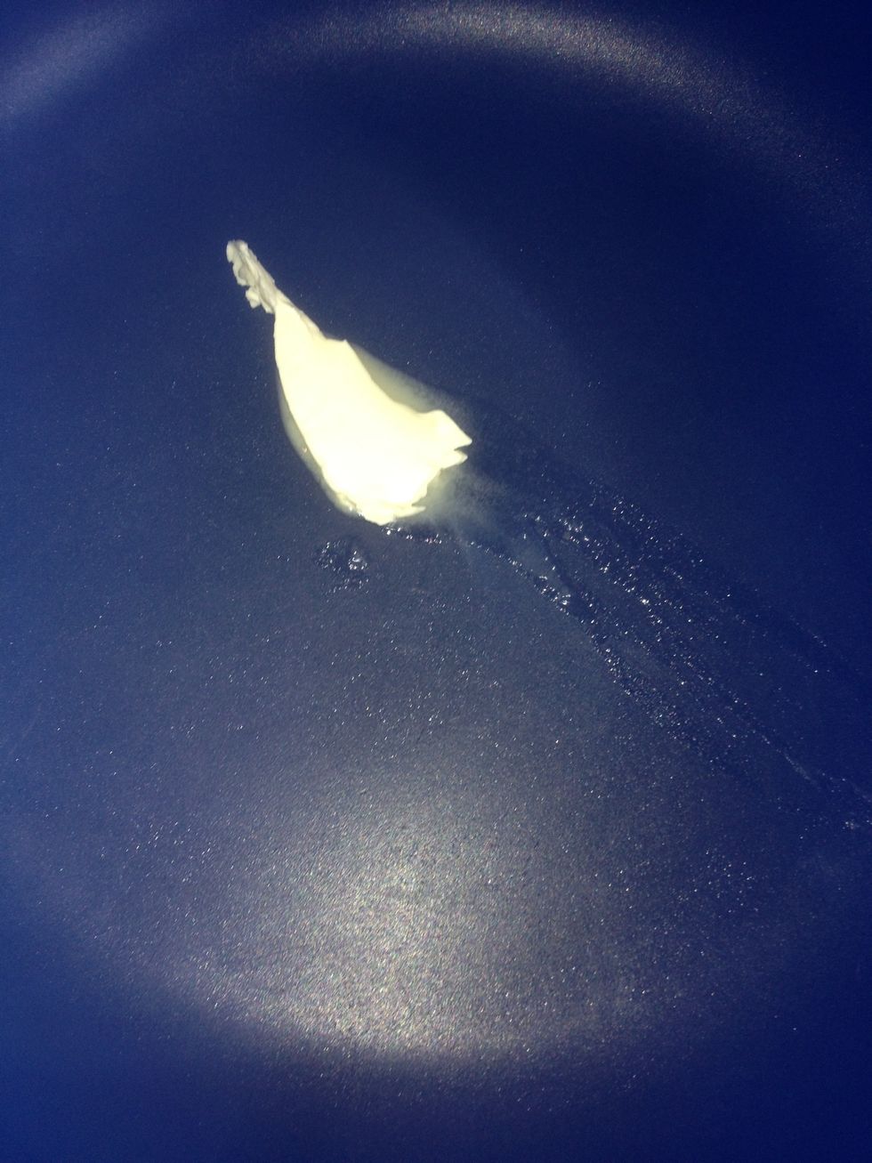 Melt up some butter in your pan. Don't burn it, heat should be low.