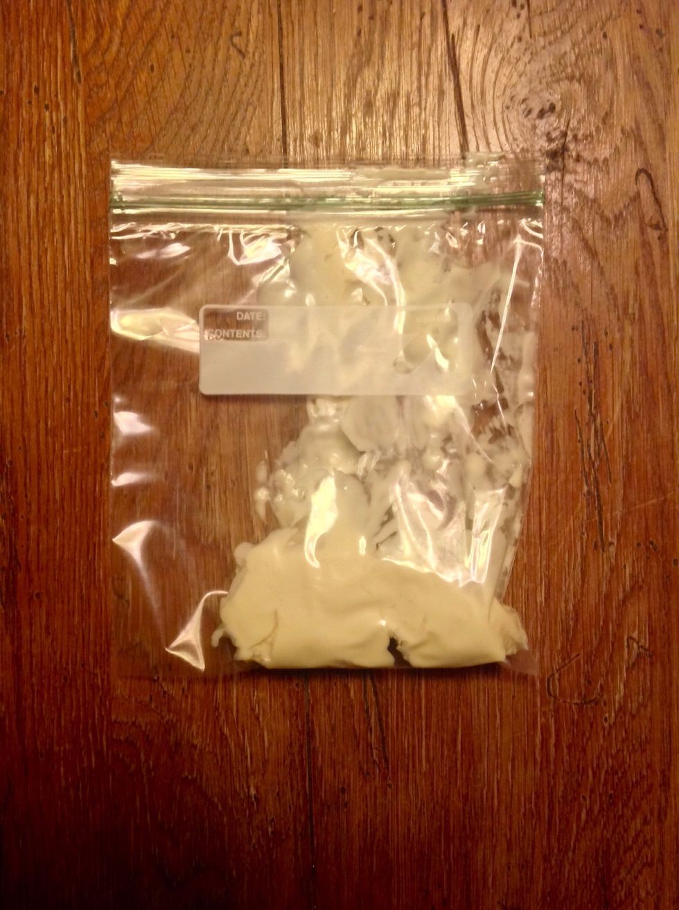 Melt white chocolate chips according to directions on package and put in small Ziplock bag.