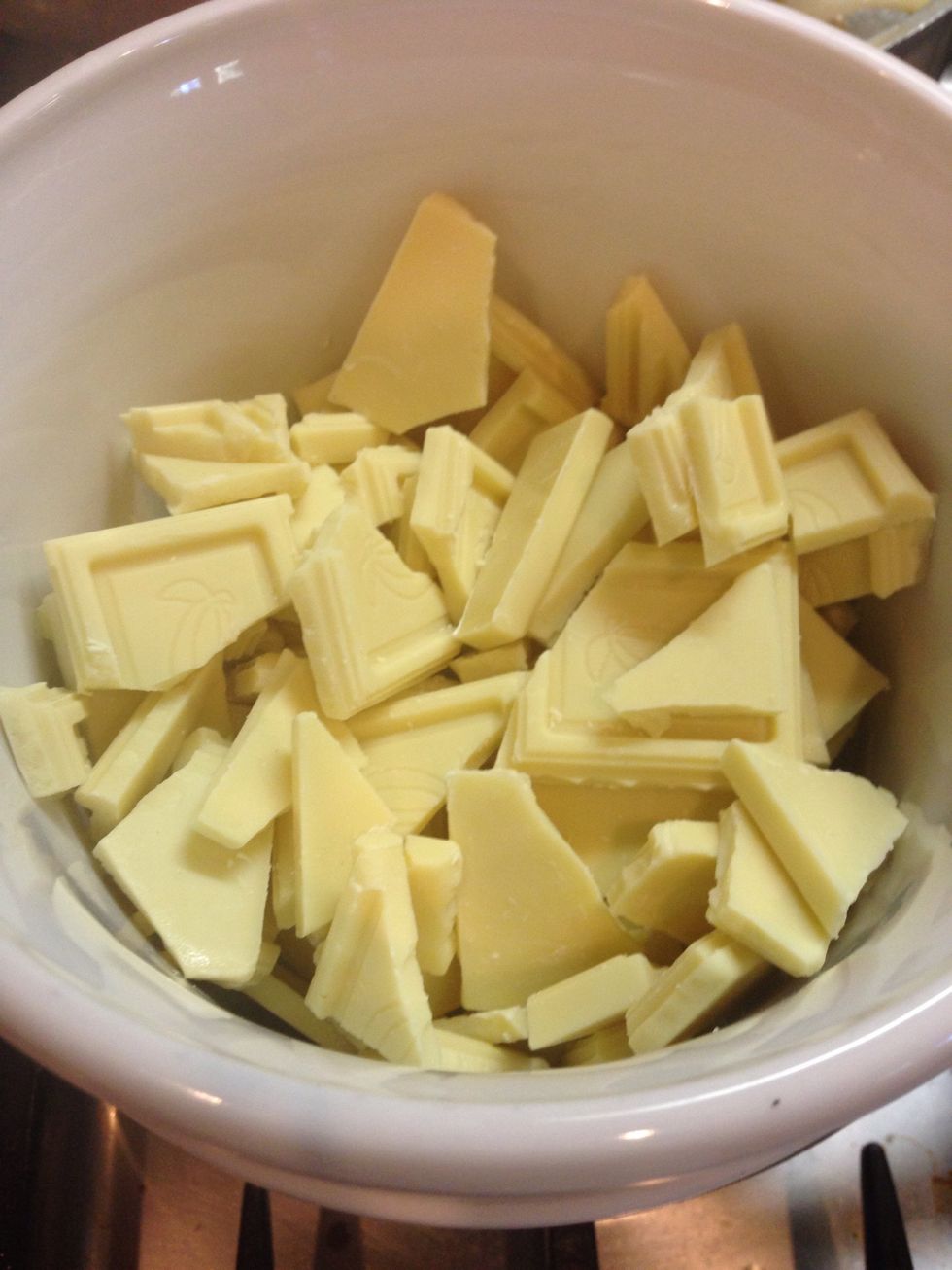 Melt white chocolate in a double boiler or in metal bowl over simmering water (don't let water touch the bottom of bowl)