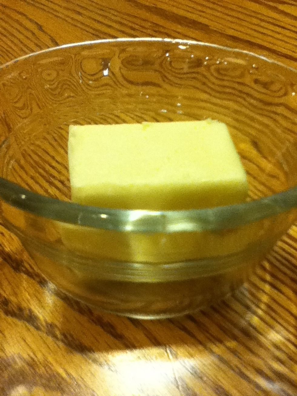 Melt your 3 tablespoons of butter in the microwave for about 2 minutes. When you take it out of the microwave it will be hot so be cautious of that.