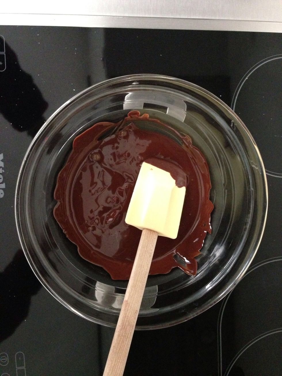 Melt your choclate in a double boiler. Make sure it is not too hot.  Take it off before all the choclate melts. That way the rest of the choclate will melt  slowly dropping its temperature.. To  30 c