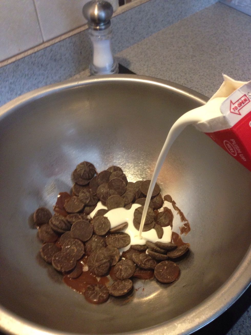 Melt your chocolate, and add some heavy whipping cream. Once done melting let chocolate cool for a few mins before adding to cream cheese.