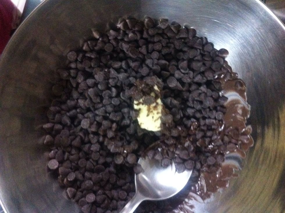 Melt your chocolate chips over a pan of hot water aka tempering the chocolate. Butter is optional