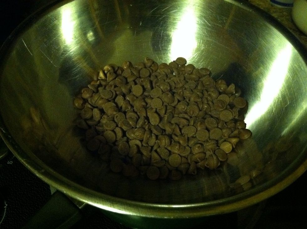 Melt your chocolate in a double boiler. Chop your Andes mints.