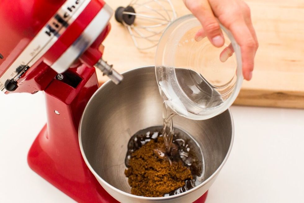 Melt your coconut oil and let cool. Then, in a electric mixer, beat together melted coconut oil and brown sugar until smooth.