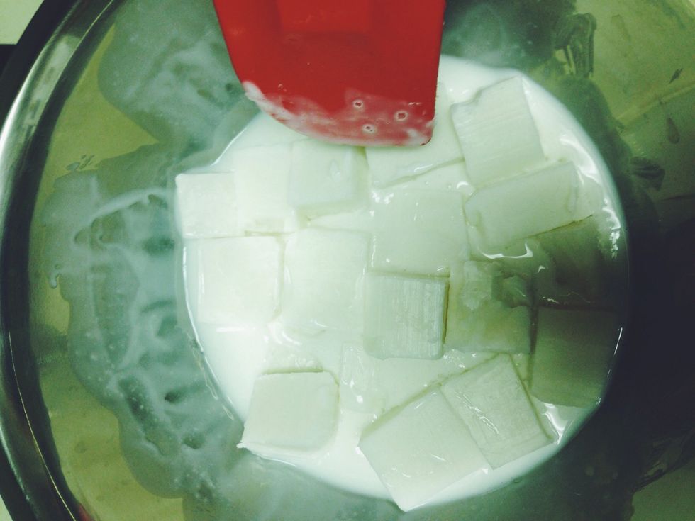 Melt your soap in your double boiler (placing dish over boiling water - don't let the dish actually touch the water).