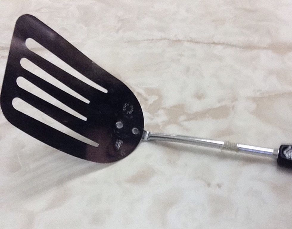 Metal Spatula. Used for flipping pancakes and flipping things on a grill or stove. I can use a spatula when I need to flip pancakes on a stove.