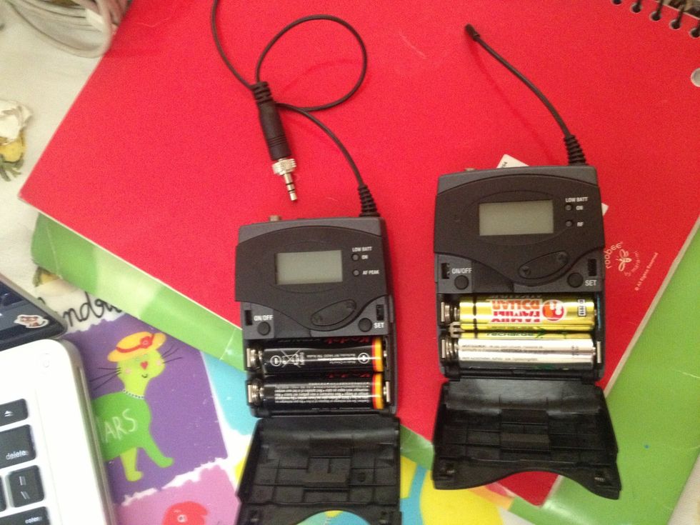 Mic should be plugged in to Mic. Open both cases and hold power on.