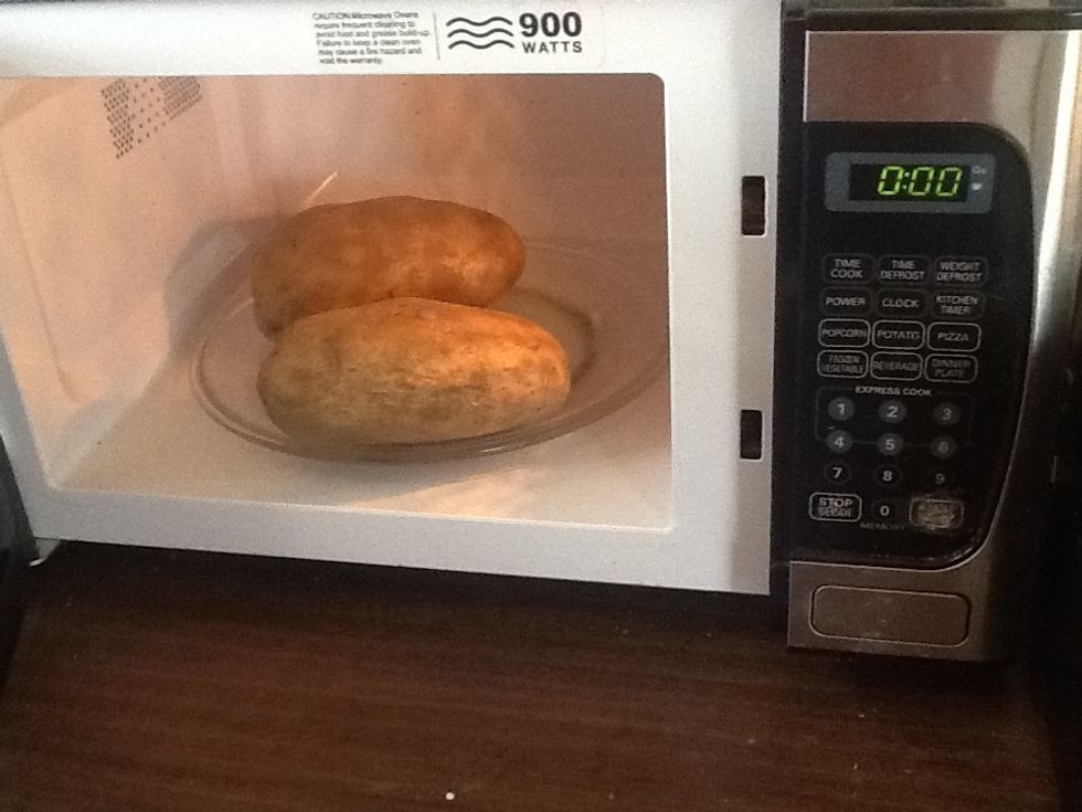 Microwave 2 potatoes for 8minutes