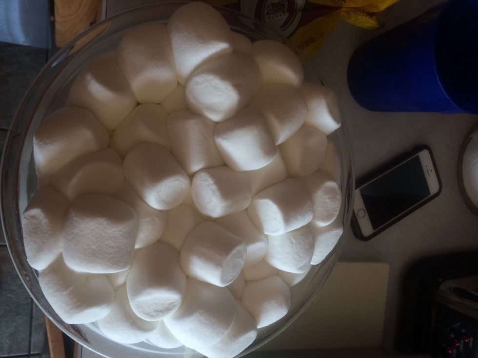 microwave all the marshmallows and 1 stick of butter until softened