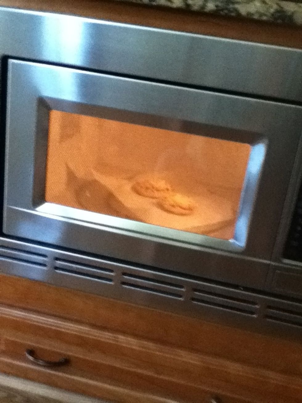 Microwave for 45 seconds, or as long as it takes to make it the temperature you want it.