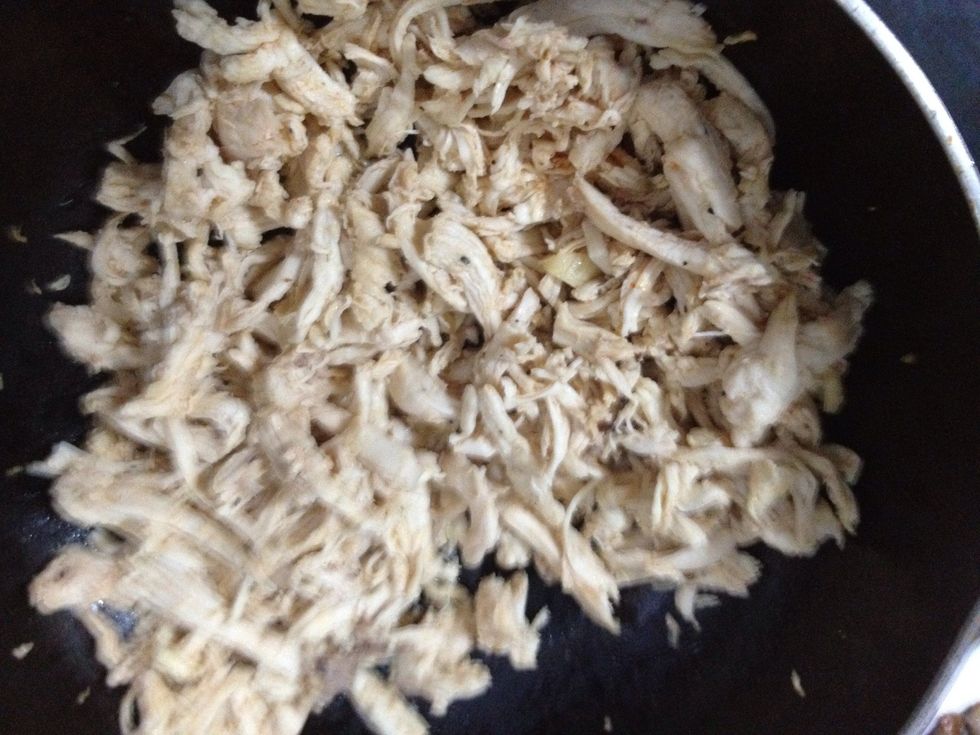 Microwave half chicken breast and shredded it into long thin pieces