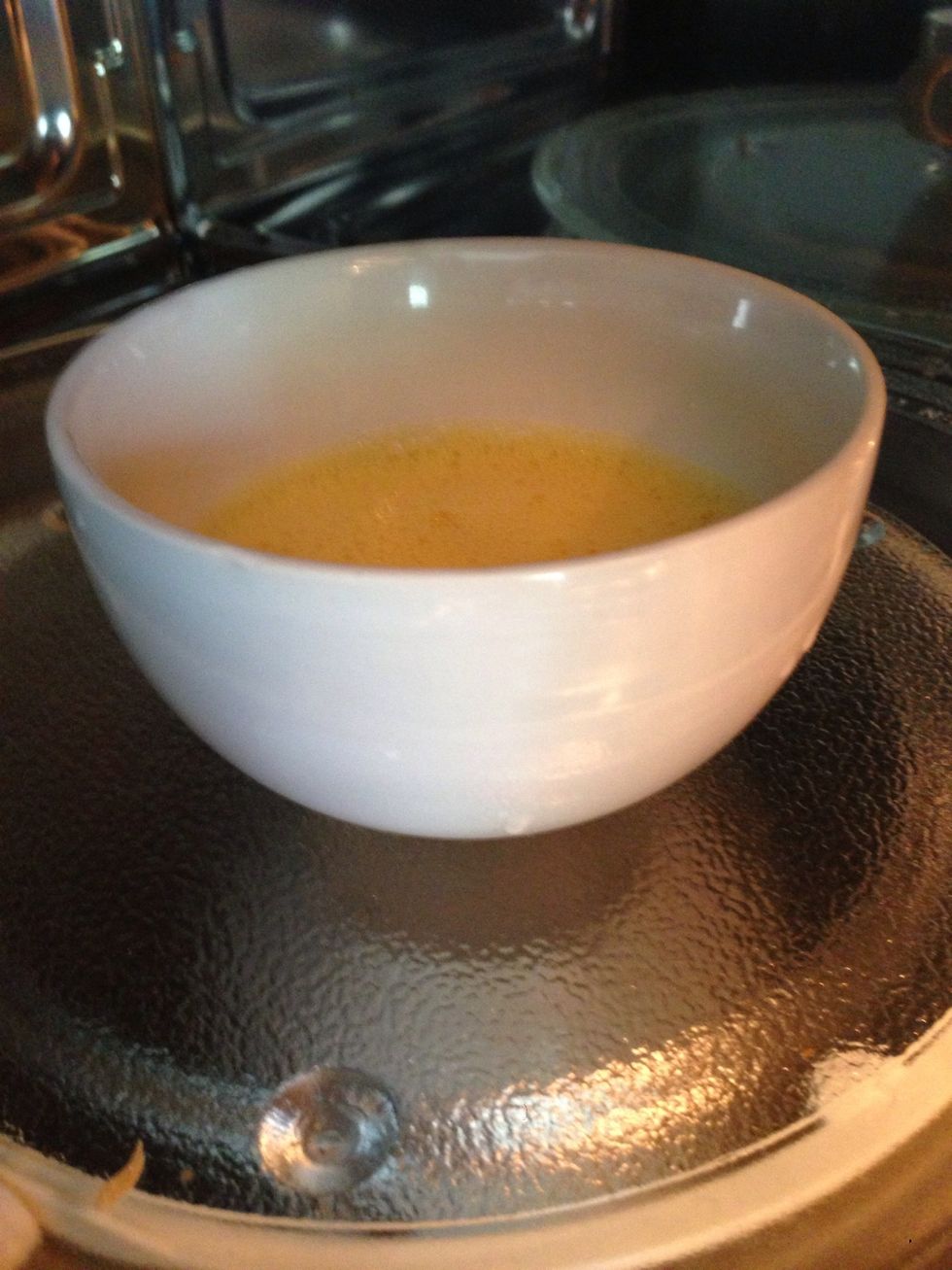 Microwave the egg for a minute and a half to two minutes, or until completely cooked.