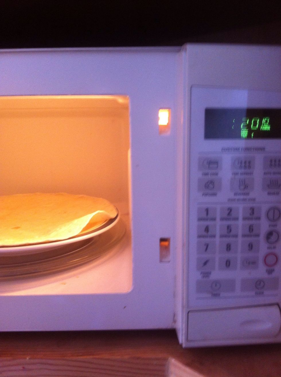 Microwave tortilla for 20 seconds so it will not tear when you fold it.