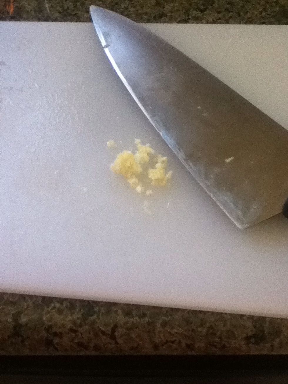 Mince 1 clove of garlic too.
