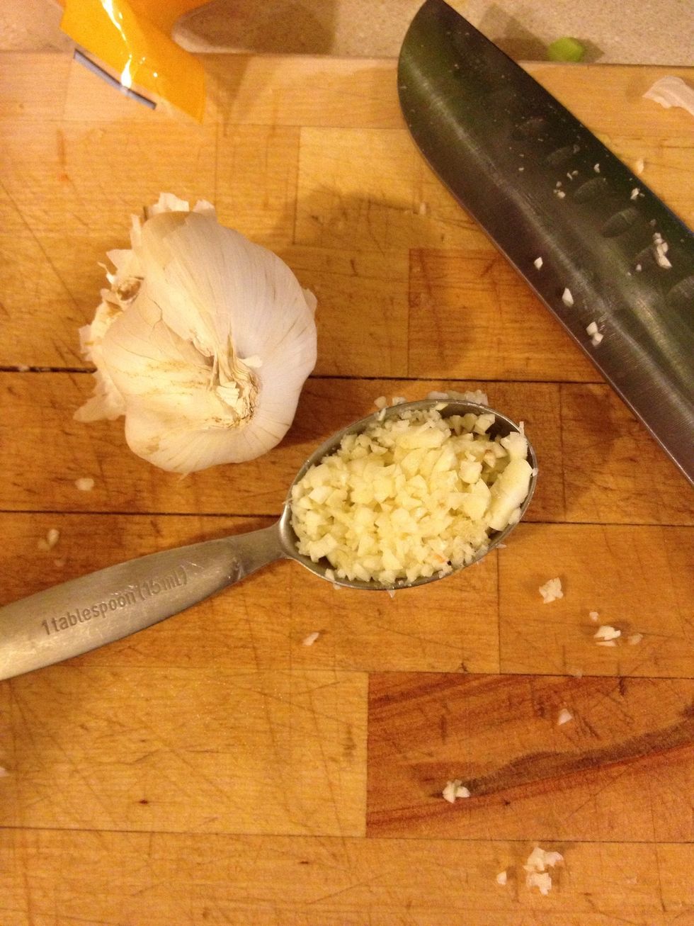 Mince 1 tablespoon of garlic. Set aside. I put into a small bowl.