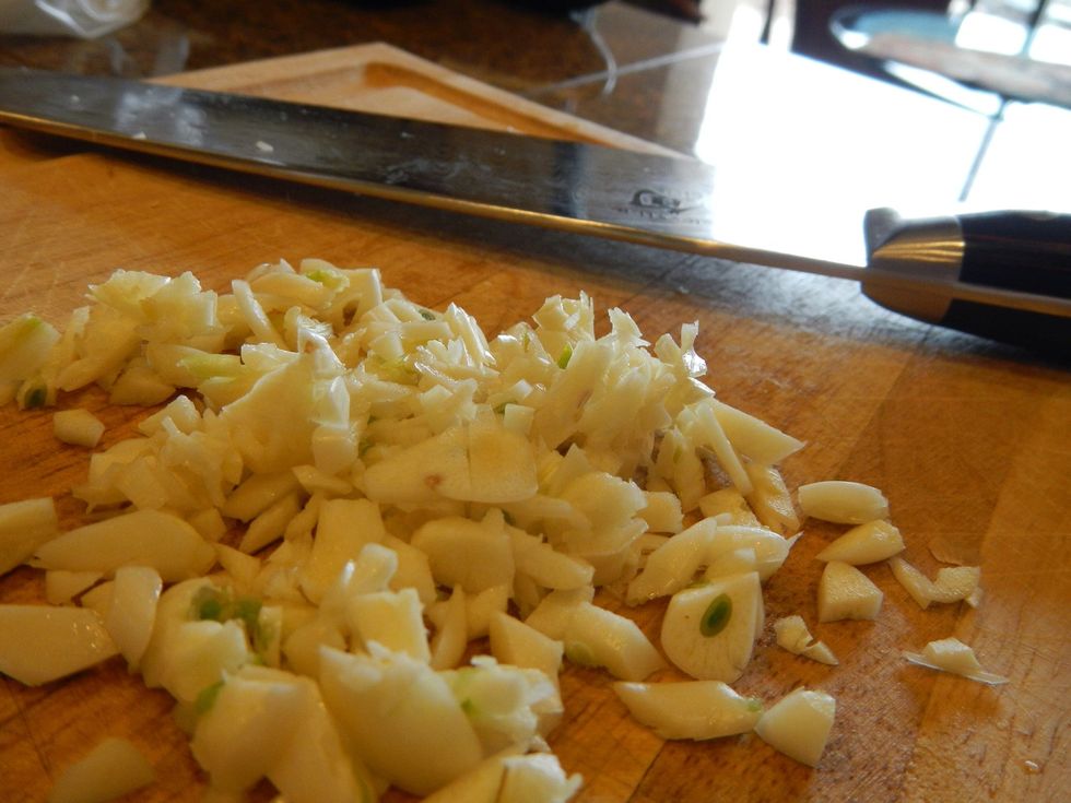 Mince 6 cloves garlic