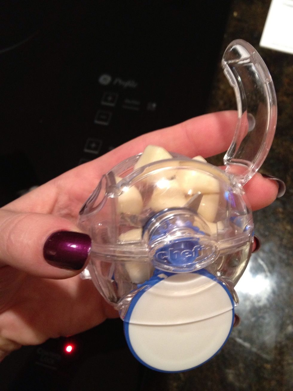 Mince garlic. I have this awesome little mincer that you roll on the counter in your hand, you can get it a Bed Bath & Beyond
