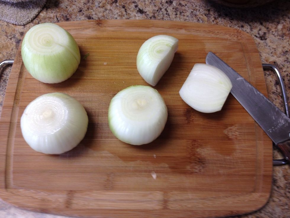 Mince half of one onion, save with bell peppers for meatballs. Slice the rest.
