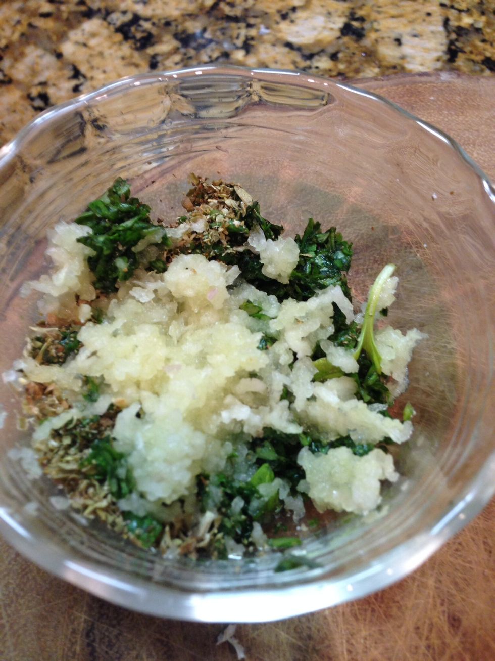 Mince herbs and garlic (I used a magic bullet)